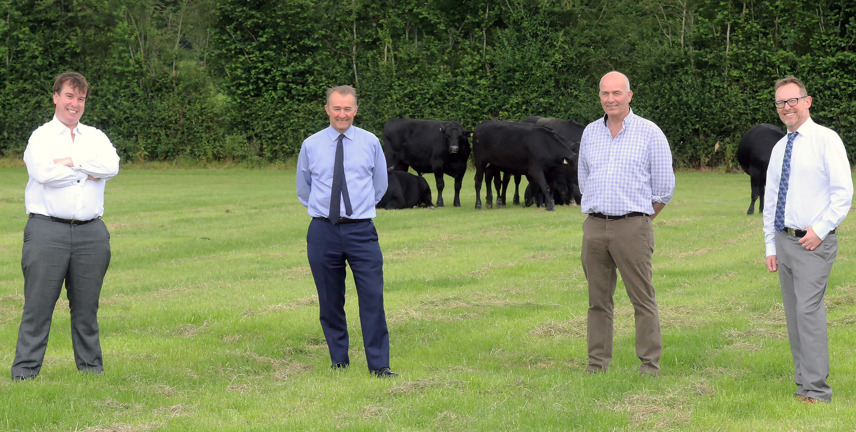 (L-R) Craig Williams MP, Secretary of State for Wales Simon Hart, Greg Pickstock and Russell George MS at Pickstock's Farm, Llanfechain. Photo by Phil Blagg Photography