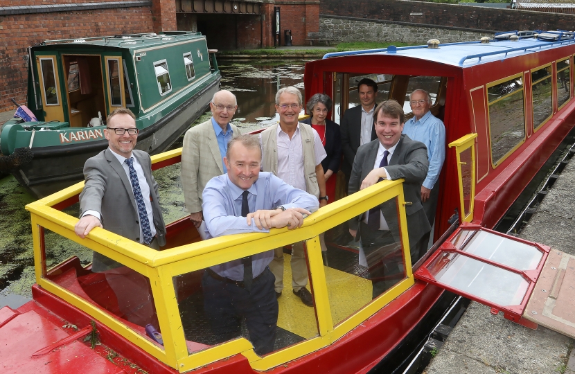 Photo shows (L-R) Russell George MS, John Dodwell – Chair of Montgomery Canal Partnership, Secretary of State for Wales Simon Hart, Owen Paterson MP, Cllr Rosemarie Harris – Leader of Powys County Council, Mark Evans - Director for Wales and South West from the Canal and River Trust/Glandwr Cymru, Craig Williams MP and Pat Ward – Vice-Chairman of the Heulwen Trust.